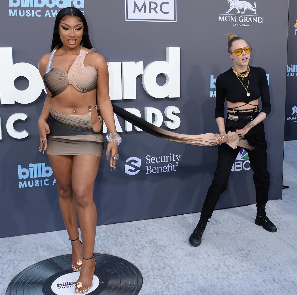 Cara Delevingne and Megan Thee Stallion at the 2022 Billboard Music Awards. - Credit: gilbertflores@broadimage / MEGA