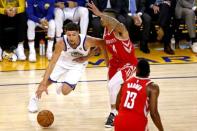 May 26, 2018; Oakland, CA, USA; Golden State Warriors guard Klay Thompson (11) drives to the basket against Houston Rockets guard Gerald Green (14) during the first quarter in game six of the Western conference finals of the 2018 NBA Playoffs at Oracle Arena. Mandatory Credit: Cary Edmondson-USA TODAY Sports