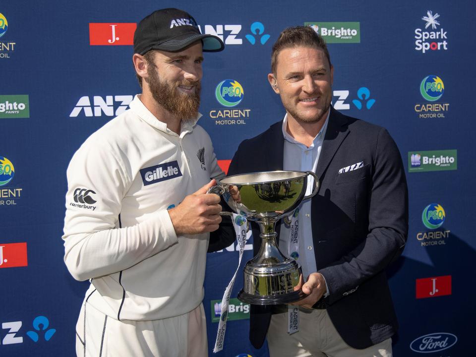 Brendon McCullum presents Kane Williamson with the ANZ test series trophy (AFP via Getty Images)