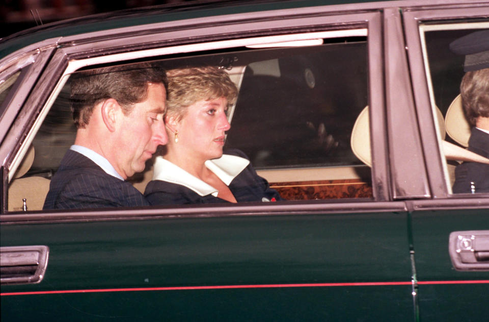 Tearful Princess Diana of Wales with Prince Charles at the Leonora Knatchbull memorial.  (Douglas Doig / AP)