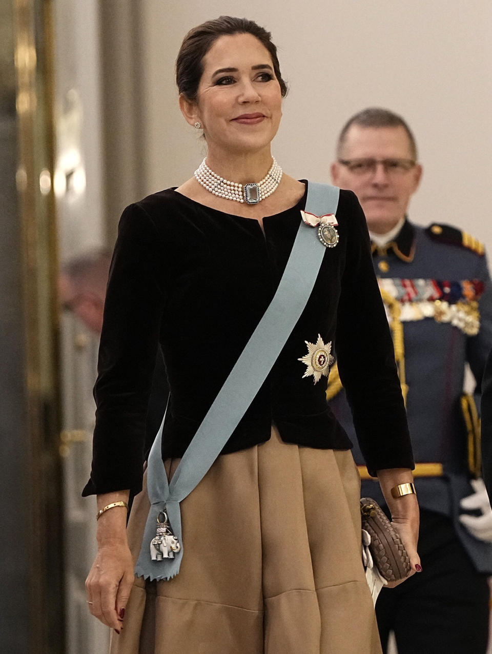 Denmark's Crown Princess Mary arrives to the traditional New Year’s fete with officers from the Armed Forces, and the National Emergency Management Agency, as well as invited representatives of major national organizations and the royal patronage at Christiansborg Castle in Copenhagen, Denmark, Thursday Jan. 4, 2024. (Mads Claus Rasmussen/Ritzau Scanpix via AP)