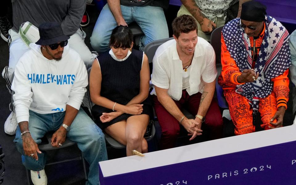 (From left) Lewis Hamilton, Nina Dobrev, Shaun White and Snoop Dogg at the Paris 2024 Summer Olympics/