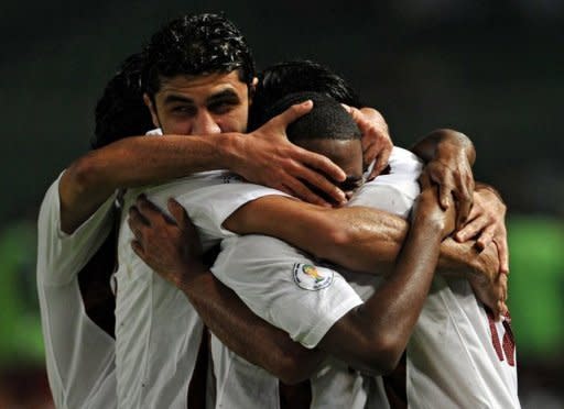 Qatar players celebrate a goal during 2014 FIFA World Cup Asian football qualifier against Indonesia at Bung Karno stadium in Jakarta. Qatar won 3-2