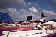 <p>Skaters warm up ahead of the women's street preliminary round during the Tokyo 2020 Olympic Games at Ariake Sports Park Skateboarding in Tokyo on July 26, 2021. (Photo by Jeff PACHOUD / AFP)</p> 