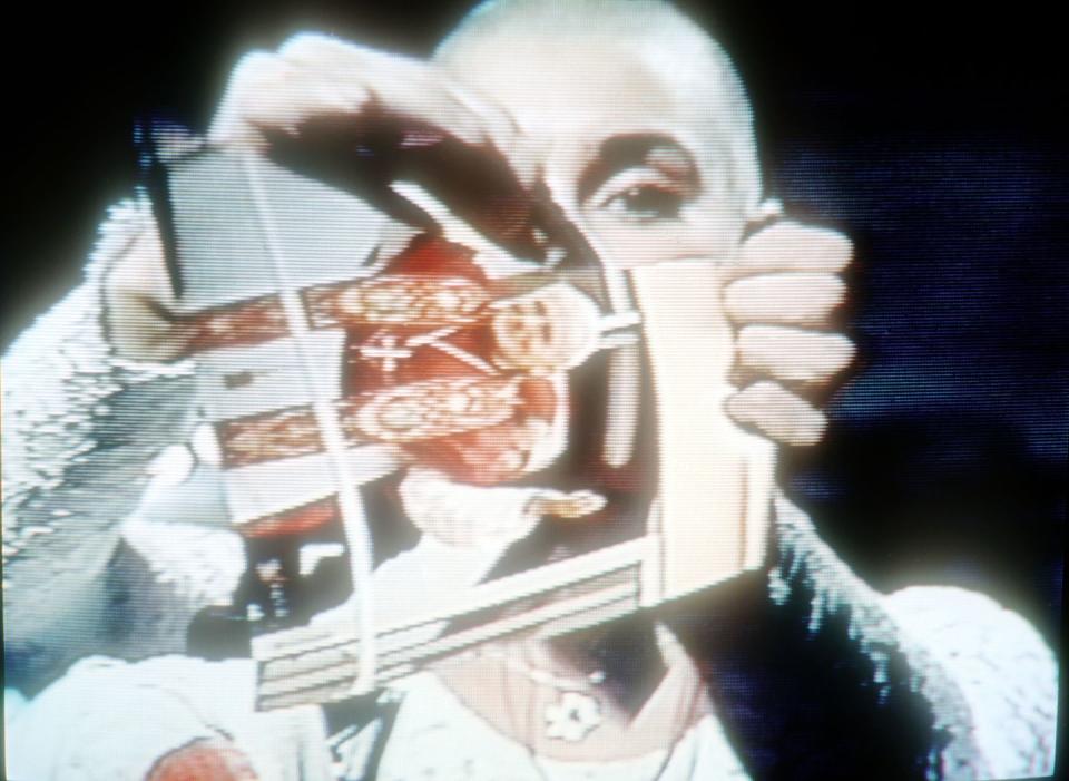 <p>In a defining moment of her career, and possibly <em>SNL</em>'s most famous controversial moment, Sinéad O’Connor concluded her 1992 performance by ripping a photo of Pope John Paul II in half. </p>