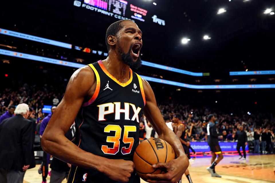 Phoenix Suns forward Kevin Durant (35) celebrates after defeating the Sacramento Kings 119-117 at the Footprint Center in Phoenix on January 16, 2024.