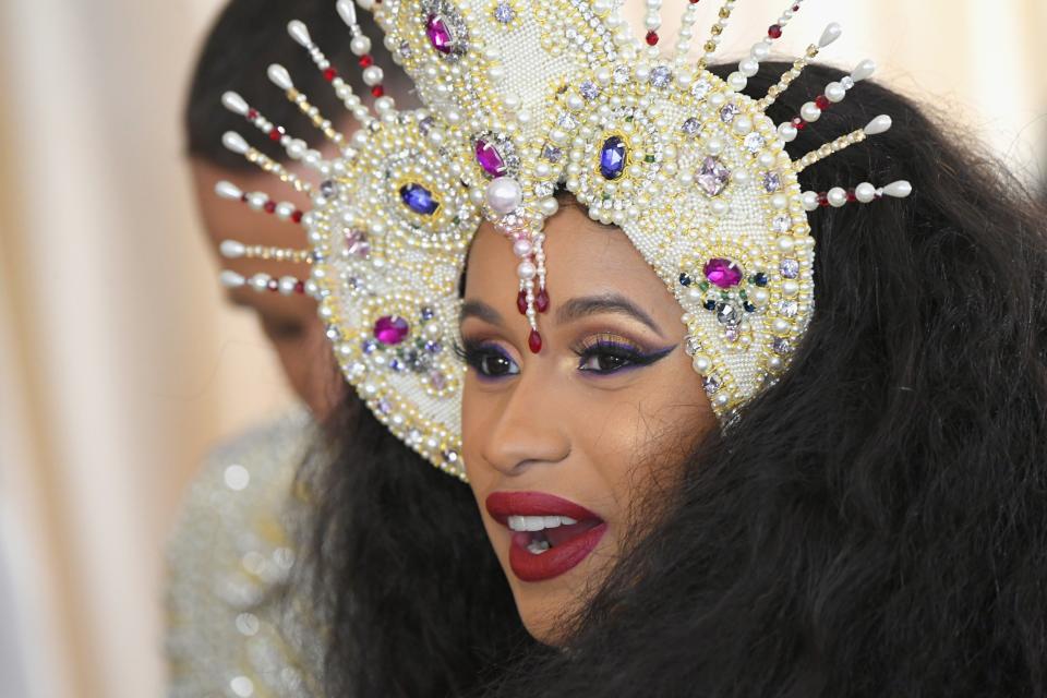 This is Cardi B's first time attending the Met Gala, and she pulled all the stops with a look from make-up artist Erika La Pearl including Kiss false eyelashes.