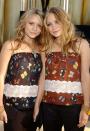 <p>Almost a decade later, the Olsen twins were still setting hair trends. Mary-Kate and Ashley's "beach wave" period was a big one and resulted in many curling iron burns over here.</p>