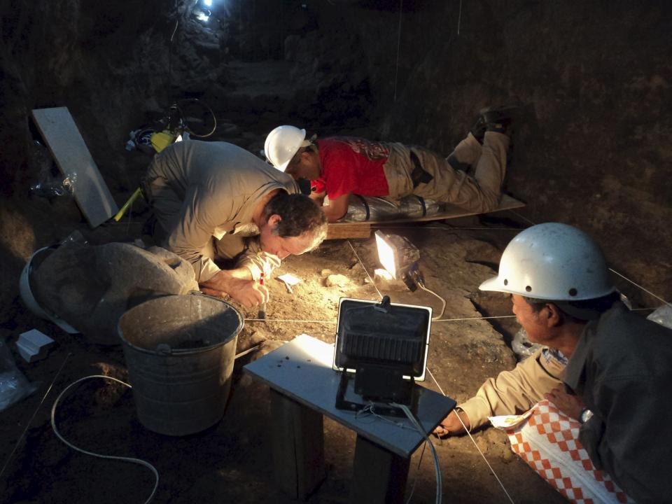 National Institute of Anthropology and History (INAH) archaeologists work at a tunnel that may lead to a royal tombs discovered at the ancient city of Teotihuacan, in this May 9, 2011 INAH handout file picture made available to Reuters October 29, 2014. A Mexican archeologist hunting for a royal tomb in a deep, dark tunnel beneath a towering pre-Aztec pyramid has made a discovery that may have brought him a step closer: liquid mercury. In the bowels of Teotihuacan, a mysterious ancient city that was once the biggest in the Americas, Sergio Gomez this month found "large quantities" of the silvery metal in a chamber at the end of a sacred tunnel sealed for nearly 1,800 years. Gomez says the excavation of the chambers should finish by October with a public announcement by the end of 2015. REUTER/INAH/Files/Handout via Reuters ATTENTION EDITORS - THIS PICTURE WAS PROVIDED BY A THIRD PARTY. REUTERS IS UNABLE TO INDEPENDENTLY VERIFY THE AUTHENTICITY, CONTENT, LOCATION OR DATE OF THIS IMAGE. FOR EDITORIAL USE ONLY. NOT FOR SALE FOR MARKETING OR ADVERTISING CAMPAIGNS.