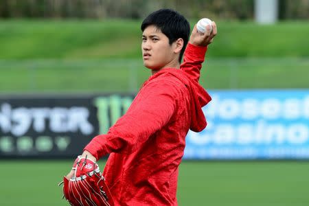 Feb 13, 2018; Tempe, AZ, USA; Los Angeles Angels pitcher Shohei Ohtani plays catch during a workout at Tempe Diablo Stadium. Mandatory Credit: Matt Kartozian-USA TODAY Sports