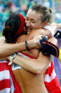 Gold medalists Kerri Walsh and Misty May-Treanor of the United States celebrate after winning the women's gold medal match against China held at the Chaoyang Park Beach Volleyball Ground during Day 13 of the Beijing 2008 Olympic Games on August 21, 2008 in Beijing, China.