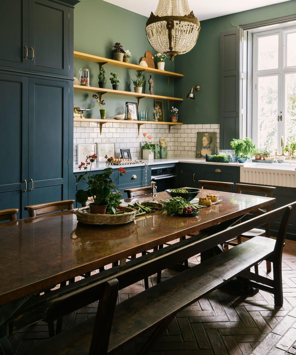 <p> Just because your French country kitchen ideas focuses on rustic style doesn&#x2019;t mean it can&#x2019;t feature a little chateau chic &#x2013; in fact, it&#x2019;s this contrast that adds just the right element of <em>je ne sais quoi</em>.&#xA0; </p> <p> French country kitchens often feature large decorative canopies over the hob and elaborate, decorative light fixtures in vintage brass or iron.&#xA0; </p> <p> Consider suspending an oversized pendant light or antique chandelier over a timeworn farmhouse table for the perfect high-low design mix. </p>