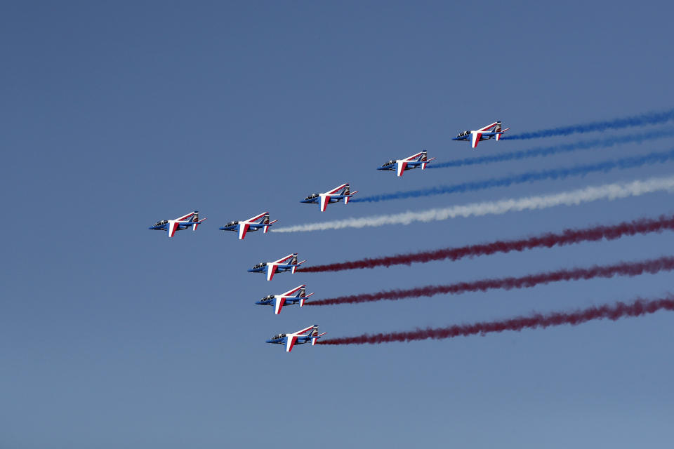 Alpha jets from the French Air Force Patrouille de France fly during the inauguration the 53rd International Paris Air Show at Le Bourget Airport near Paris, France, Monday June 17, 2019. The world's aviation elite are gathering at the Paris Air Show with safety concerns on many minds after two crashes of the popular Boeing 737 Max. (Benoit Tessier/Pool via AP)