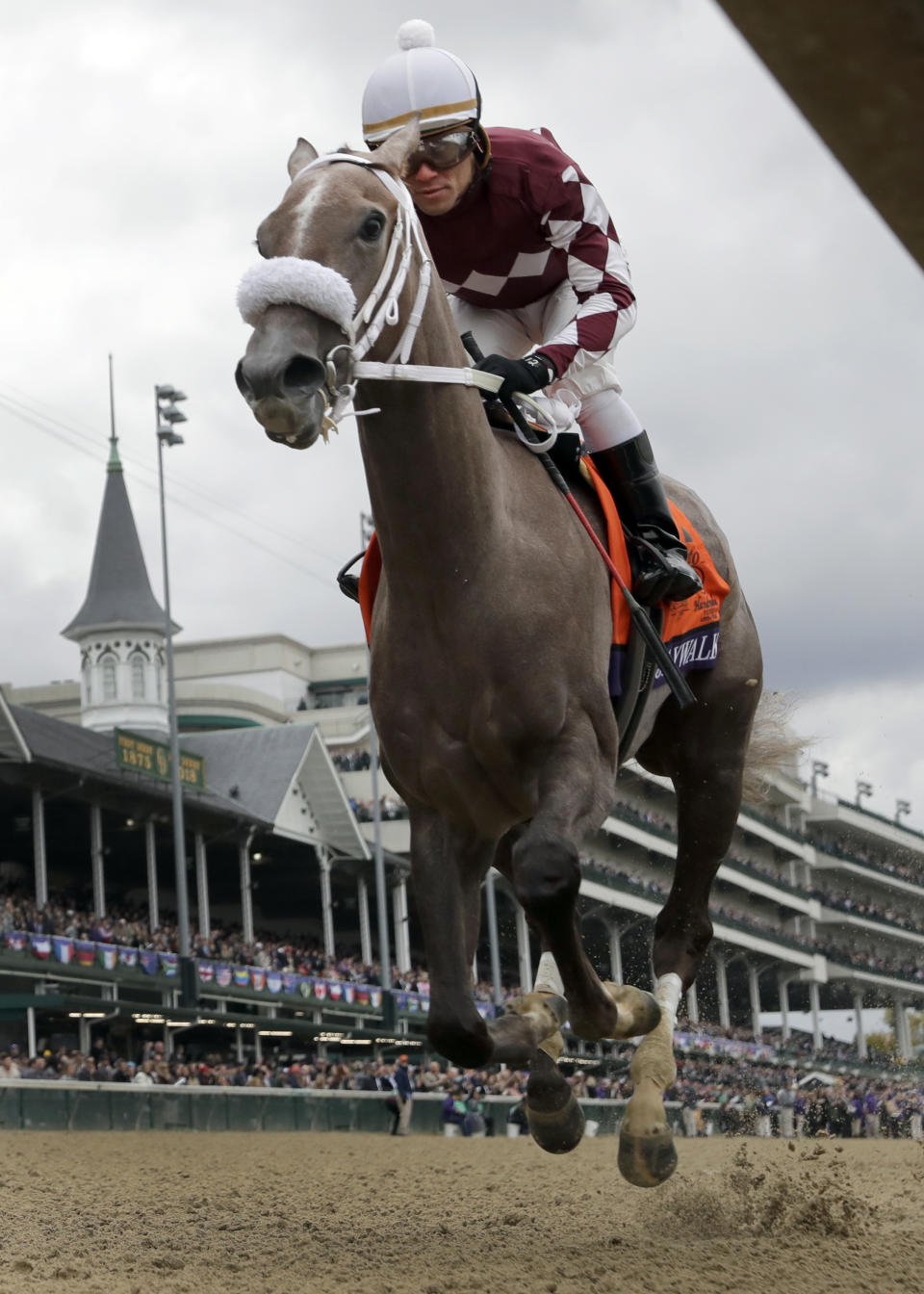 Joel Rosario rides Jaywalk to victory in the Breeders' Cup Juvenile Fillies horse race at Churchill Downs, Friday, Nov. 2, 2018, in Louisville, Ky. (AP Photo/Darron Cummings)