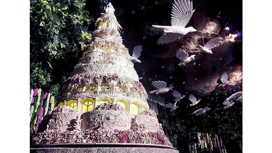 The castle cakes are made with Styrofoam inside, covered with icing fondant and decorated with sugar flowers - making the outside entirely edible.