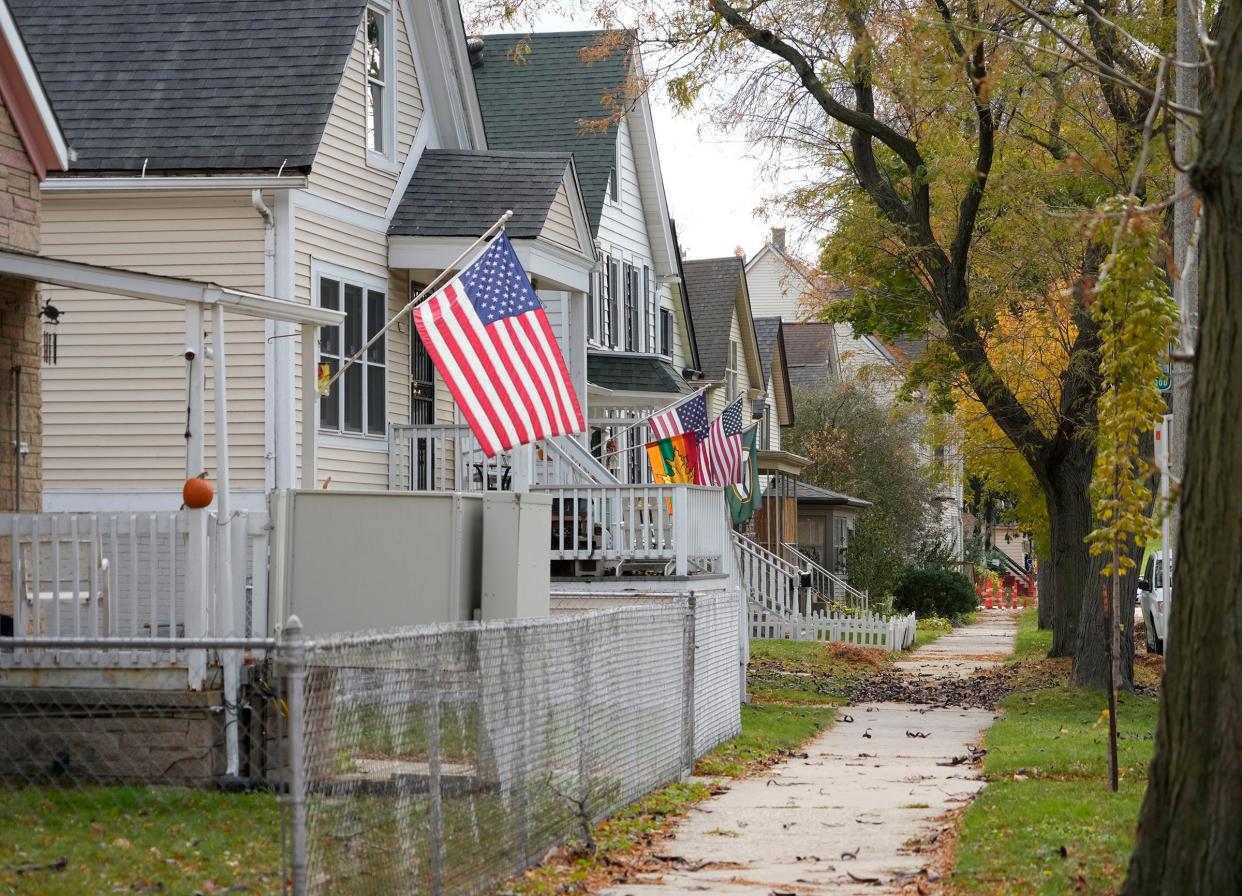 Houses line North 40th Street just south of West Clybourn Street in the Piggsville neighborhood.