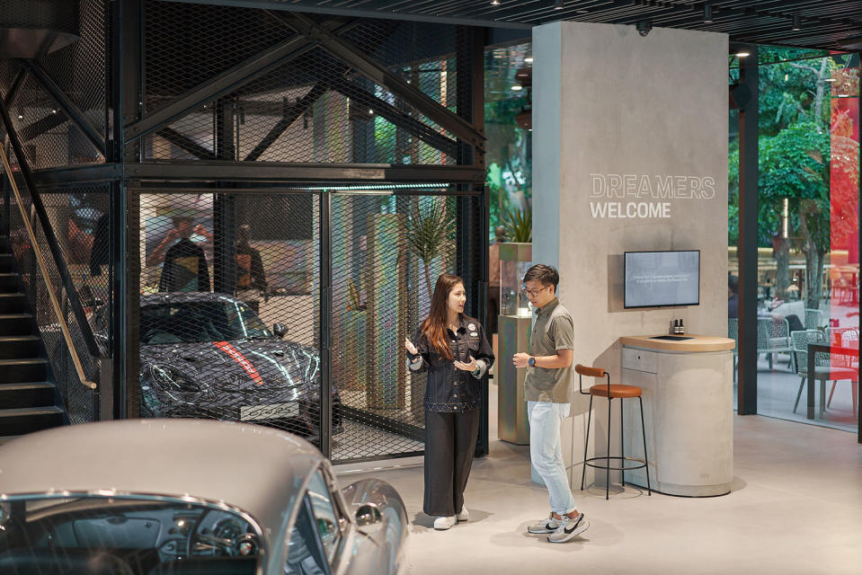 porsche studio singapore reception car lift 911 guoco midtown