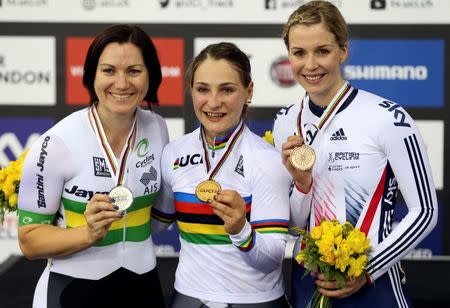 Winner Kristina Vogel of Germany (C), second placed Anna Meares of Australia (L) and third placed Rebecca James of Great Britain pose on the podium after the Women's Keirin final at the UCI Track Cycling World Championships in London, Britain, March 3, 2016. REUTERS/Matthew Childs