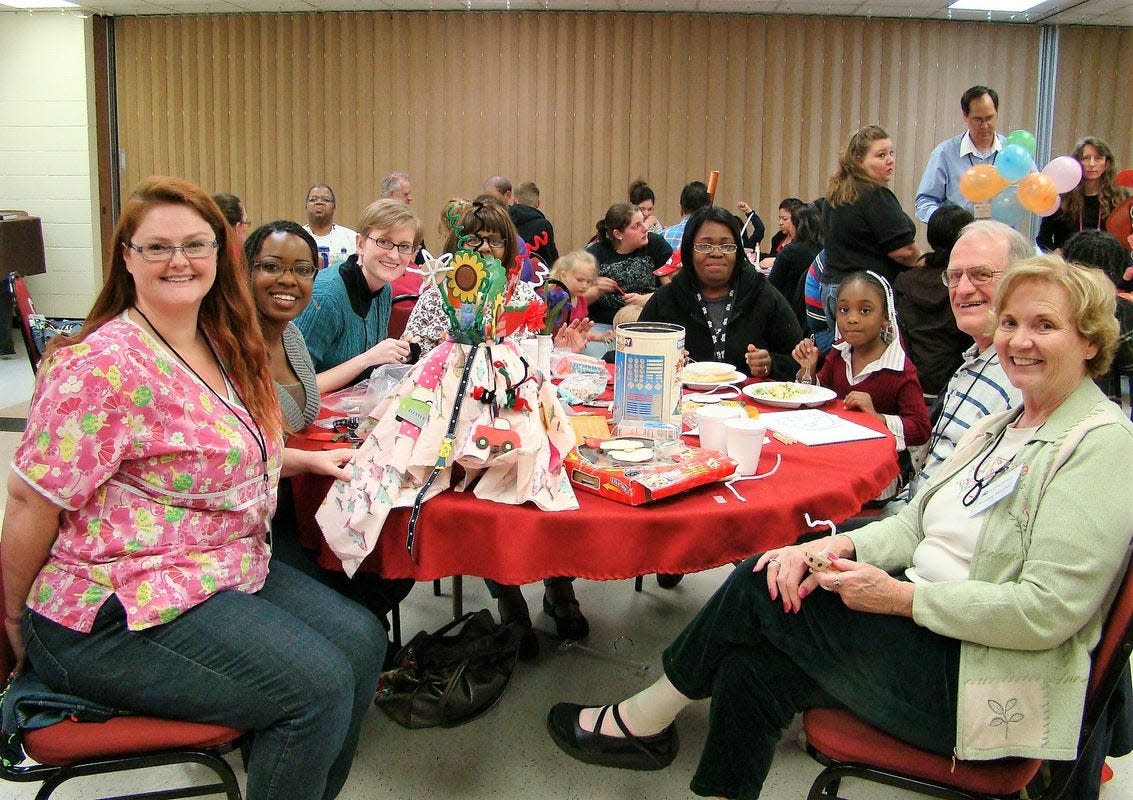 In one of its many outreach events, Building Bridges of Oklahoma brings communities together to help overcome the obstacles affecting the stability of families.