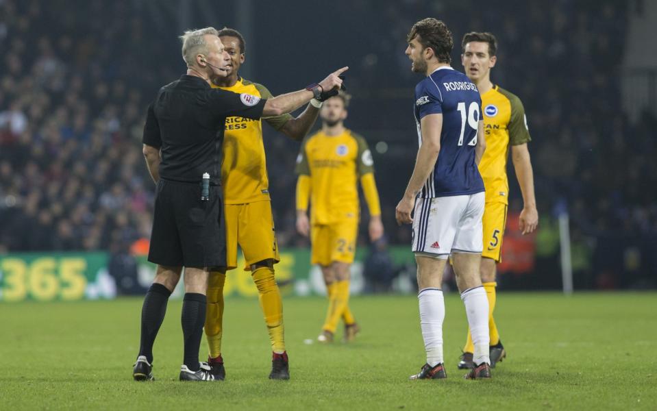 Gaetan Bong reports the alleged remarks made by Jay Rodriguez to the referee - Action Plus