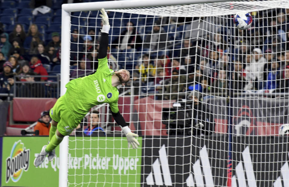 CF Montreal goalkeeper Jonathan Sirois fails to the stop the ball from getting into the net on a kick by New England Revolution midfielder Dylan Borrero in the first half of an MLS soccer match Saturday, April 8, 2023, in Foxborough, Mass. (AP Photo/Mark Stockwell)