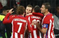 Football Soccer - Bayer Leverkusen v Atletico Madrid - UEFA Champions League Round of 16 First Leg - BayArena, Leverkusen, Germany - 21/2/17 Atletico Madrid's Kevin Gameiro celebrates scoring their third goal from the penalty spot with Yannick Carrasco and Antoine Griezmann Reuters / Wolfgang Rattay Livepic