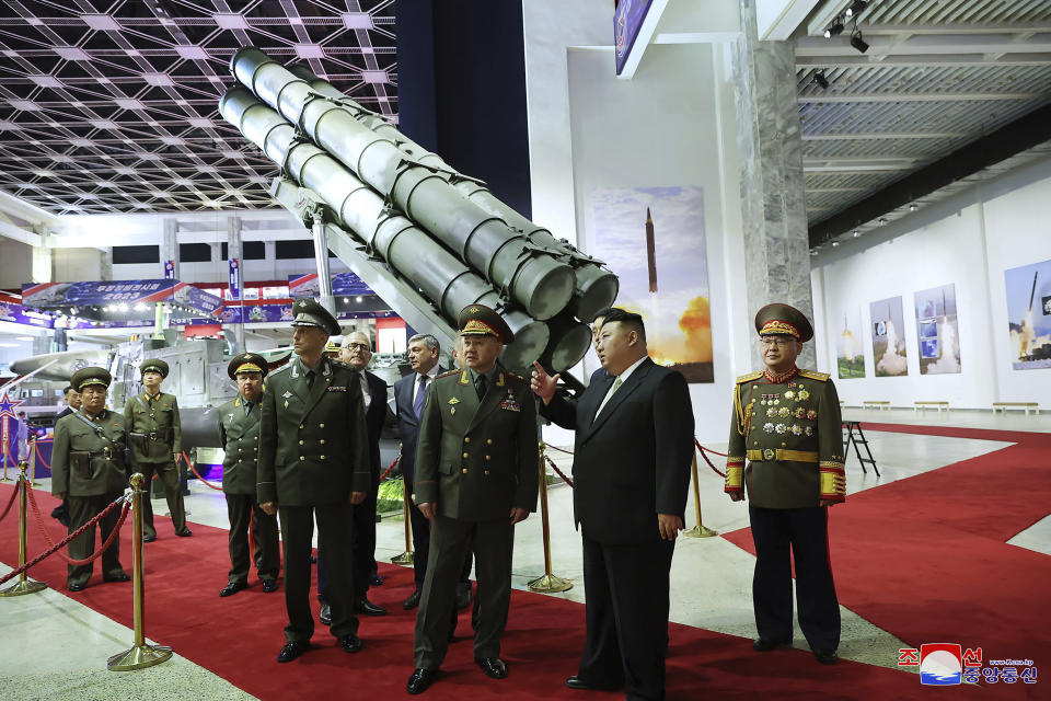 In this photo provided by the North Korean government, North Korean leader Kim Jong Un, second right, and Russian Defense Minister Sergei Shoigu, third right, visit an arms exhibition in Pyongyang, North Korea Wednesday, July 26, 2023. Independent journalists were not given access to cover the event depicted in this image distributed by the North Korean government. The content of this image is as provided and cannot be independently verified. Korean language watermark on image as provided by source reads: "KCNA" which is the abbreviation for Korean Central News Agency. (Korean Central News Agency/Korea News Service via AP)