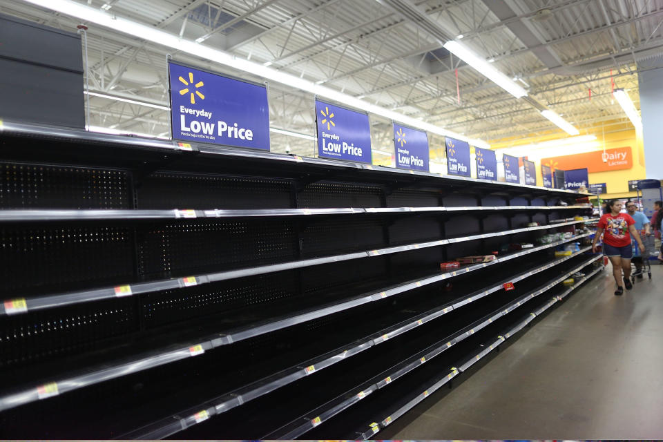 The bread section of a Walmart store is empty in Houston.&nbsp;