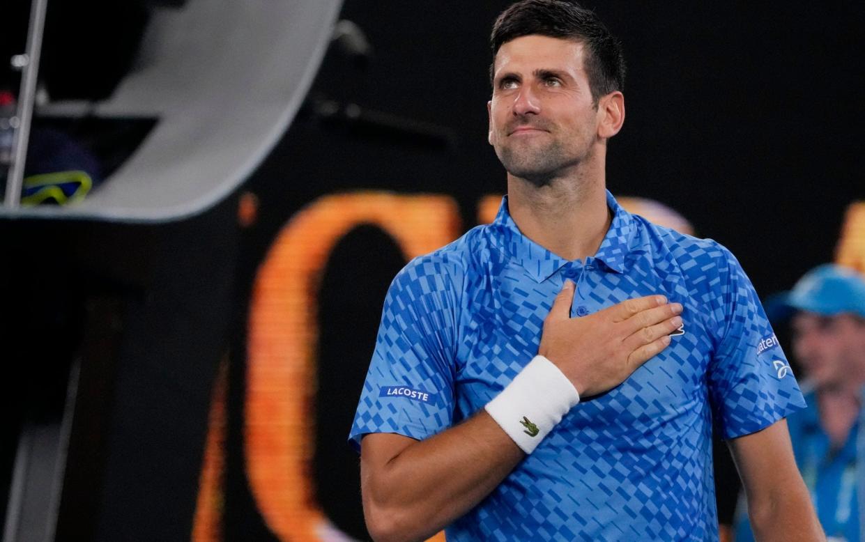 Novak Djokovic of Serbia reacts after defeating Roberto Carballes Baena of Spain in their first round match at the Australian Open - Aaron Favila/AP