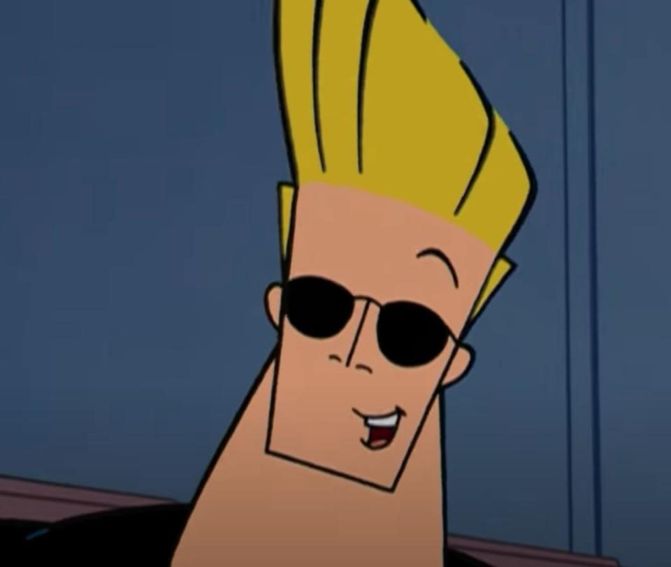 Johnny Bravo sits at a movie theater with a date who is in disguise