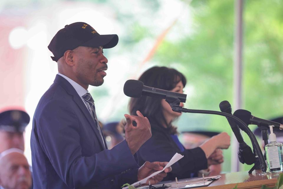 State Rep. Nnamdi Chukwuocha gives remarks during a Memorial Day ceremony Monday, May 30, 2022, at War Memorial Plaza near New Castle.