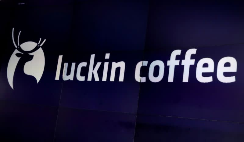 FILE PHOTO: A screen displays the logo for Luckin Coffee during the company's IPO at the Nasdaq Market site in New York