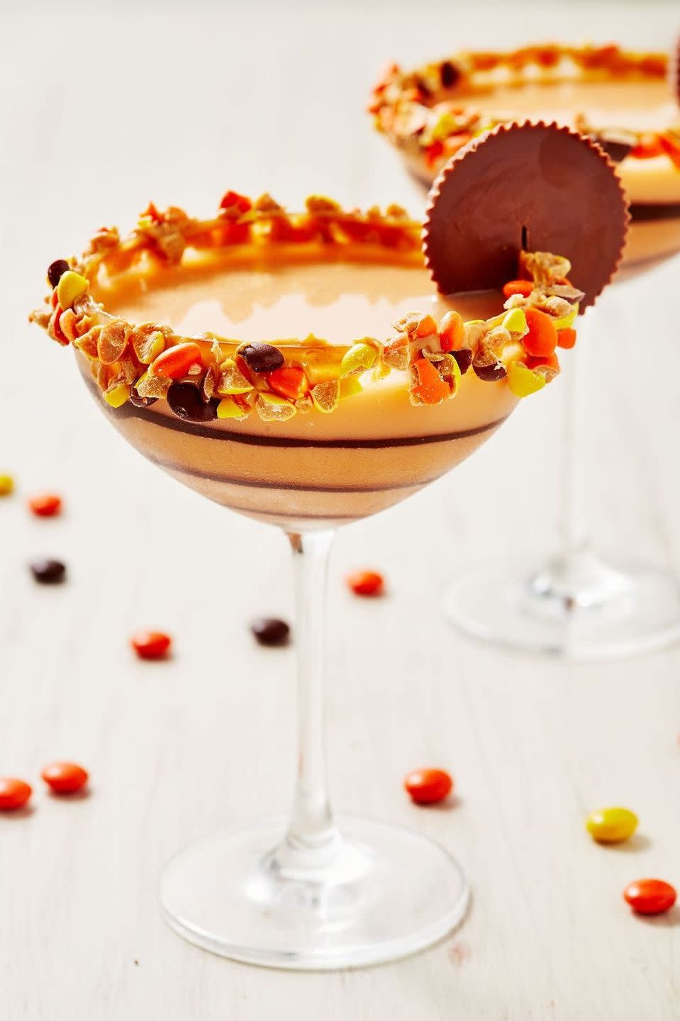 <p>Reese's + vodka = this amazing Halloween cocktail everyone will love. </p><p>Get the <a href="https://www.delish.com/cooking/recipe-ideas/recipes/a58358/drunken-peanut-butter-cups-recipe/" rel="nofollow noopener" target="_blank" data-ylk="slk:Drunken Peanut Butter Cups recipe;elm:context_link;itc:0;sec:content-canvas" class="link "><strong>Drunken Peanut Butter Cups recipe</strong></a> from Delish. </p>