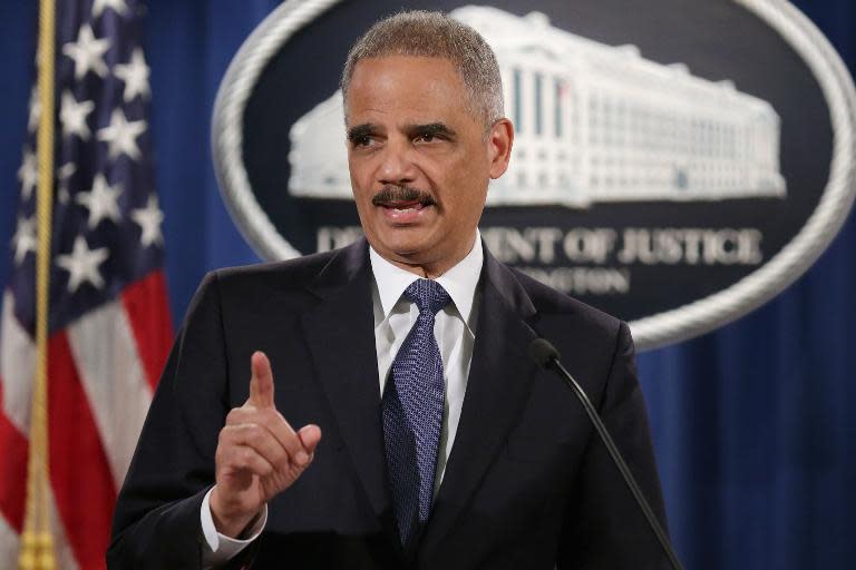 Attorney General Eric Holder delivers remarks about the Justice Department's findings related to two investigations in Ferguson, Missouri