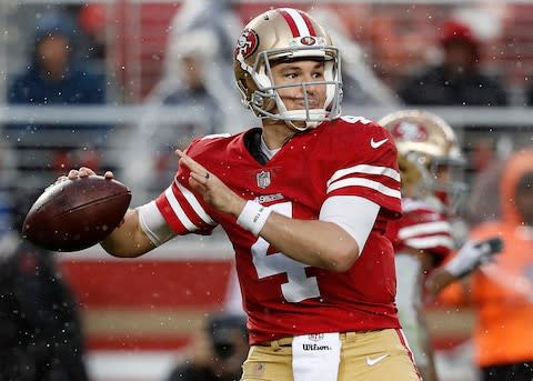 San Francisco 49ers quarterback Nick Mullens (4) passes against the Seattle Seahawks during the second half of an NFL football game in Santa Clara - Credit: AP Photo/Tony Avelar