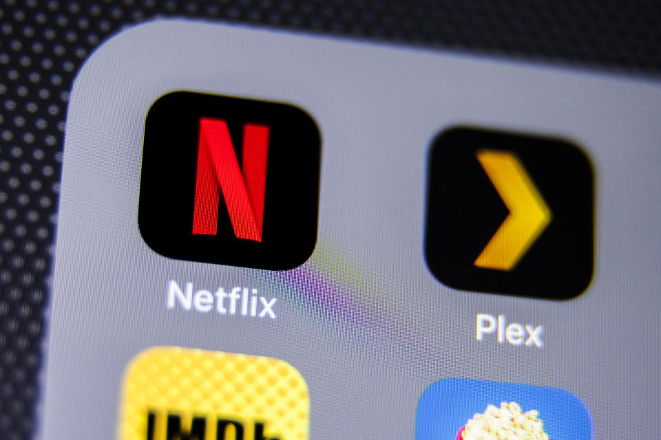 La Habra, United States - August 2, 2016: Macro closeup image of Netflix app icon among other icons on an iphone smartphone device. 