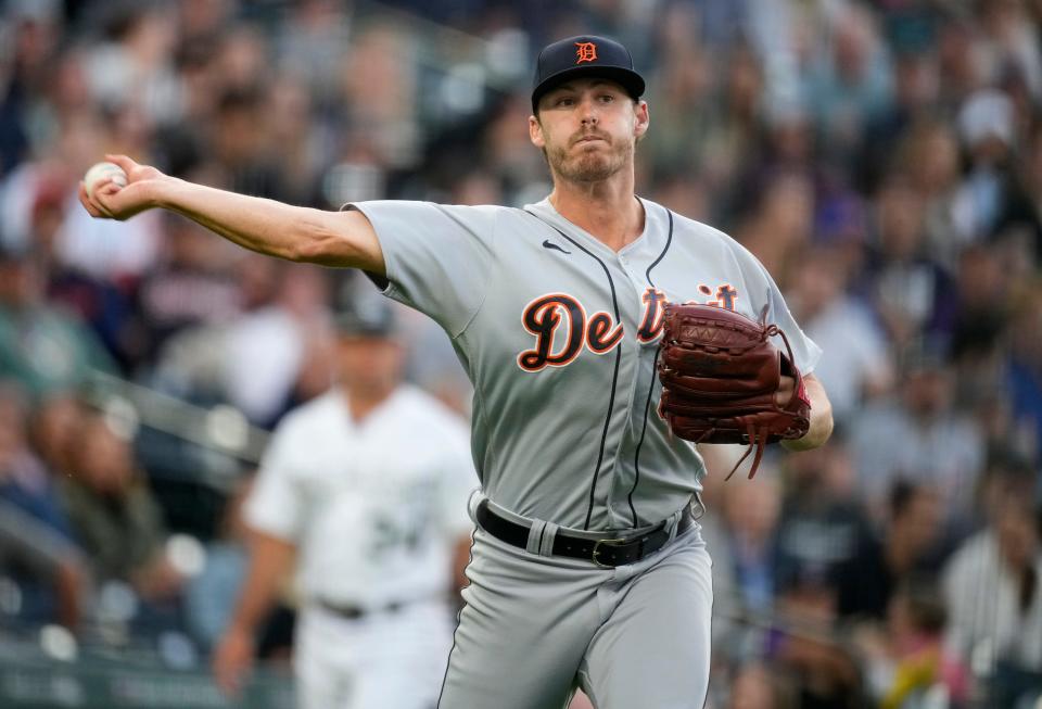 Detroit Tigers relief pitcher Mason Englert throws to first base to put out Colorado Rockies' Kris Bryant to end the sixth inning at Coors Field in Denver on Friday, June 30, 2023.