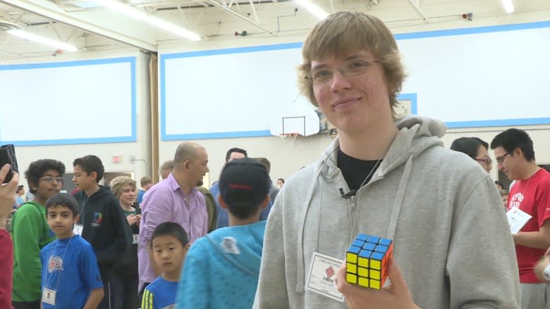 Speedcubing record breaker just wanted to beat his brother