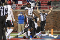 Cincinnati running back Gerrid Doaks (23) celebrates a touchdown run against SMU during the second half of an NCAA college football game Saturday, Oct. 24, 2020, in Dallas. (AP Photo/Jeffrey McWhorter)