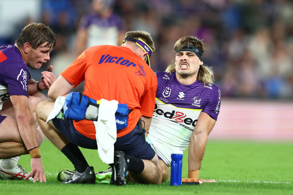 GOLD COAST, AUSTRALIA - MAY 04: Ryan Papenhuyzen of the Storm is injured during the round nine NRL match between Gold Coast Titans and Melbourne Storm at Cbus Super Stadium, on May 04, 2024, in Gold Coast, Australia. (Photo by Chris Hyde/Getty Images)