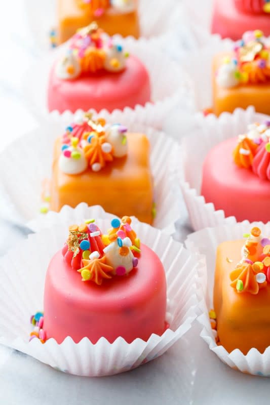 <p>Love and Olive Oil</p><p>Traditional petit fours get a sprinkle of fun: tart apricot and raspberry jam sandwiched between layers of rich, almond pound cake dotted with rainbow sprinkles, all covered in a colorful poured fondant glaze.</p><p><strong>Get the recipe: <a href="https://www.loveandoliveoil.com/2019/07/funfetti-fours.html" rel="nofollow noopener" target="_blank" data-ylk="slk:Funfetti Petit Fours;elm:context_link;itc:0;sec:content-canvas" class="link rapid-noclick-resp">Funfetti Petit Fours</a></strong></p>