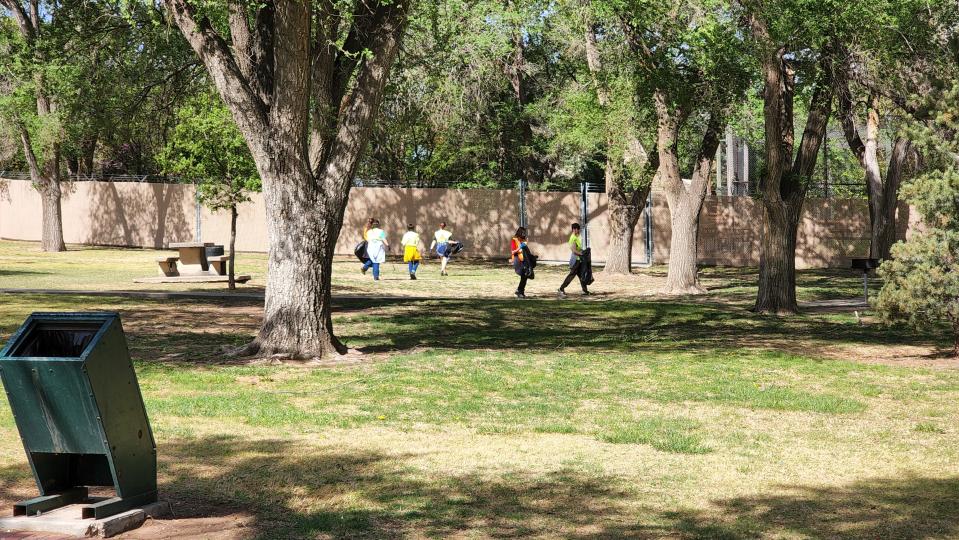 Members of the Amarillo community help to clean up green spaces at Thompson Memorial Park Saturday for Earth Day.