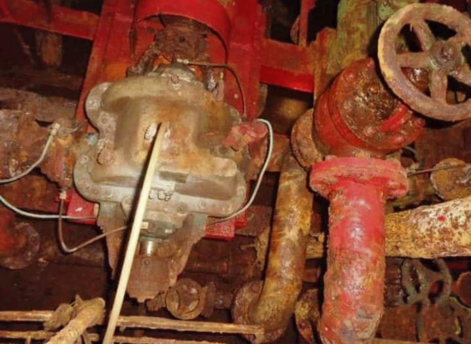 This image provided by I.R. Consilium taken in 2019, shows the extent of the corrosion in the boiler system inside the FSO Safer tanker, moored off Ras Issa port, Yemen. Houthi rebels are blocking the United Nations from inspecting the abandoned oil tanker loaded with more than one million barrels of crude oil. Internal documents obtained by the AP showed that seawater has entered the engine compartment of the tanker, which has been left without maintenance for over five years, causing damage to the pipelines and increasing the risk of sinking. Rust has covered parts of the tanker and the inert gas that prevents the tanks from gathering inflammable gases, has leaked out. (I.R. Consilium via AP)