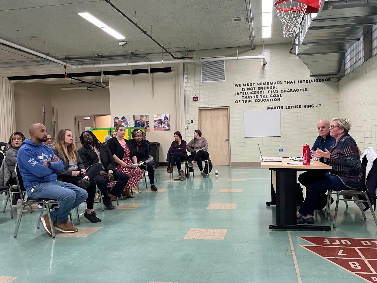 From right, Penfield Montessori Academy Board of Directors President Christine Holmes, and board member Bob Mikulay explain to parents and staff why they chose to close to the school, during a 2023 meeting.