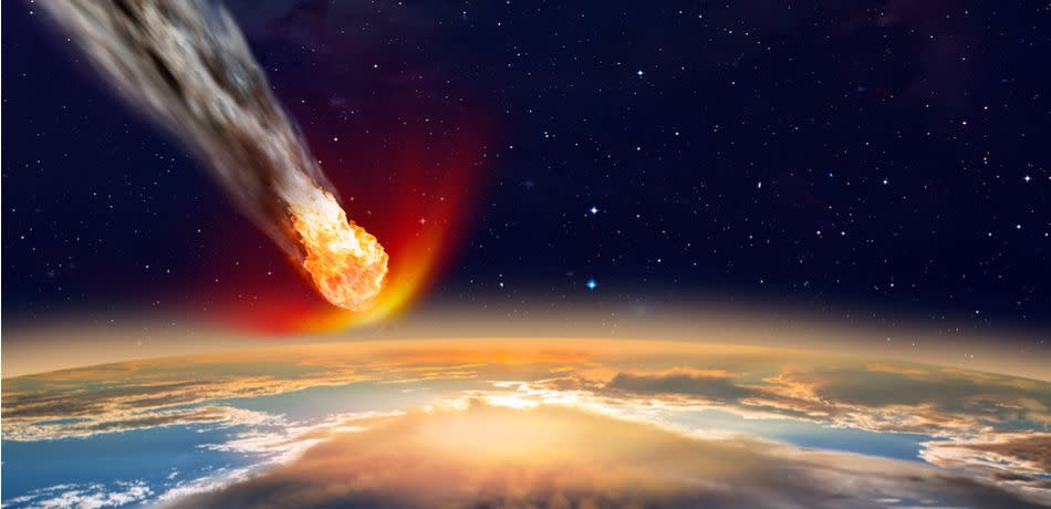 Artist's impression of an asteroid colliding with Earth.