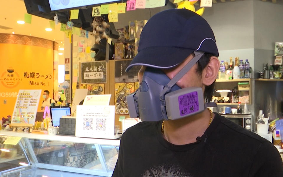 In this May 4, 2020, image made from video, a shop owner who spoke on condition of anonymity because of fear of retribution, talks about his tear gas flavor ice cream in Hong Kong. A Hong Kong ice cream shop has created this flavor using pepper, in memory of all the tear gas fired by the Hong Kong police in recent months. The flavor is a sign of support for the pro-democracy movement, which is seeking to regain its momentum during the coronavirus pandemic, the owner said. (AP Photo)