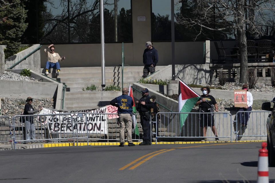 Demonstrators showing their support for Palestinians protest near where President Joe Biden was speaking at the Washoe Democratic Party Office in Reno, Nev., Tuesday March 19, 2024. (AP Photo/Jacquelyn Martin)