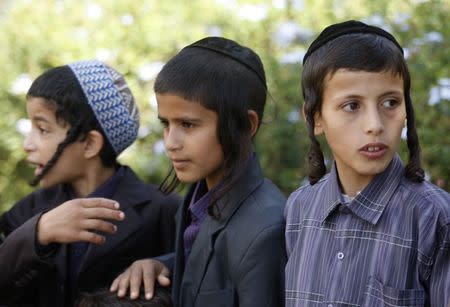 Yemeni Jewish boys are seen at their housing compound during the Jewish Passover holiday in Sanaa in this April 9, 2009 file photo. REUTERS/Khaled Abdullah/Files