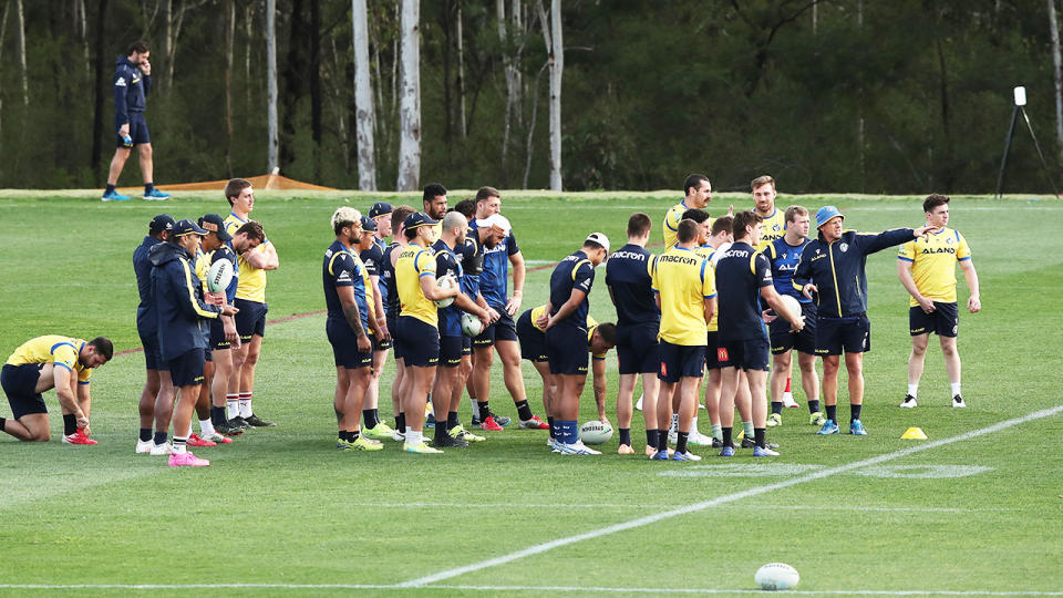 Parramatta Eels players, pictured here training at Kellyville Park before moving to Queensland.