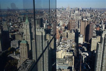 The Manhattan skyline is seen from the 68th floor of the 4 World Trade Center tower in New York, November 13, 2013. REUTERS/Shannon Stapleton